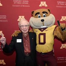 Tom Swain with Goldy Gopher