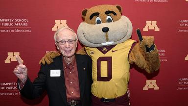 Tom Swain with the Goldy Gopher mascot