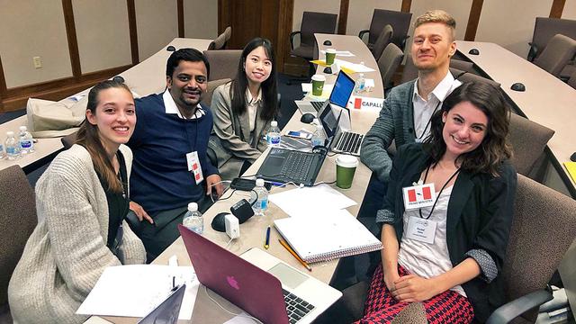 Group photo of five Humphrey students at NASPAA global simulation 