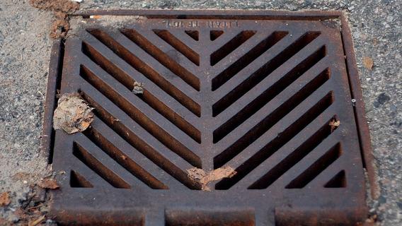 A storm drain embedded into a street