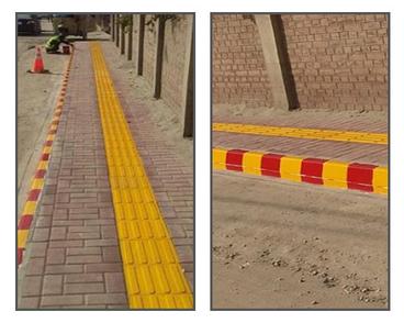 Tactile paving tiles indicate a safe pathway