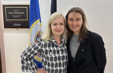 Iryna Drobovych stands with a woman outside the office of Senator Amy Klobuchar e